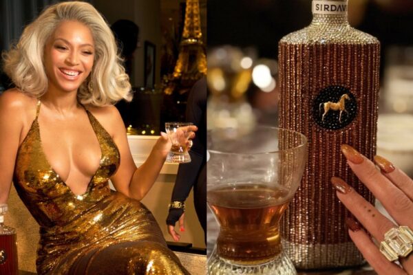 Beyonce Gucci HED Beyoncé Glitters in Gold Gucci Dress for SirDavis Paris Event, Accessorizes with Bedazzled Whiskey Bottle Purse