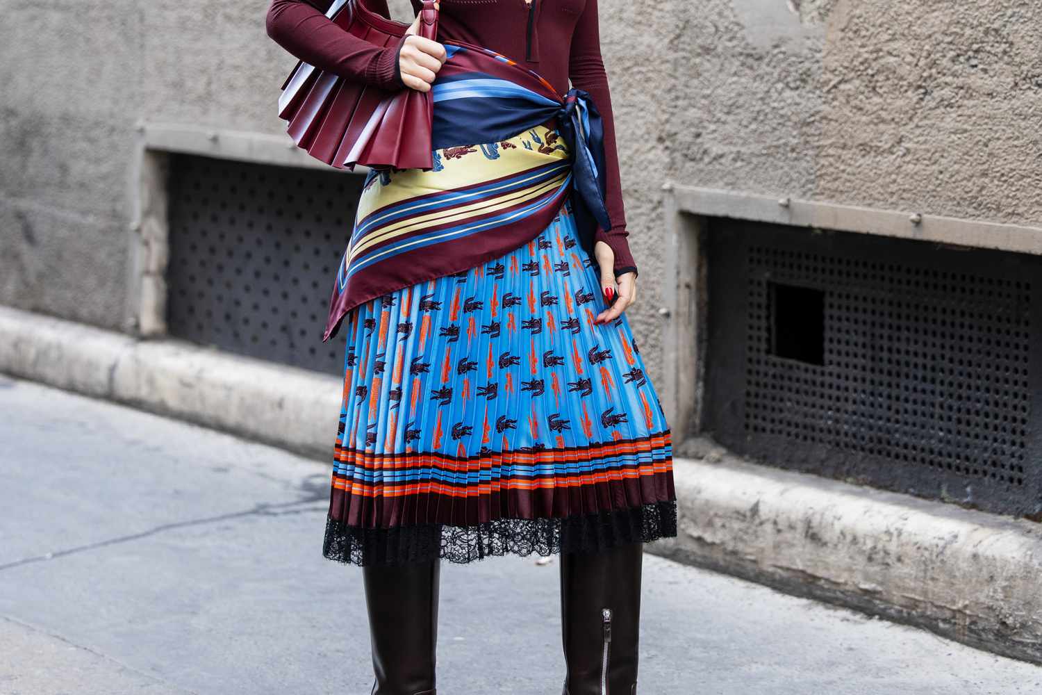 fall skirt trends GettyImages 2176245353 ed9f54276a3c4d9c949330aaade186e6 7 Fall Skirt Trends You’re Going to See Everywhere, According to Stylists